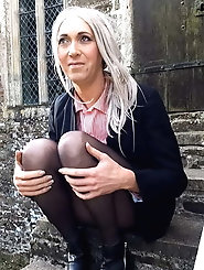 Lascivious trollop is taking off her bra