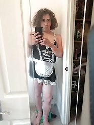 Shemale cutie is posing almost nude on photo